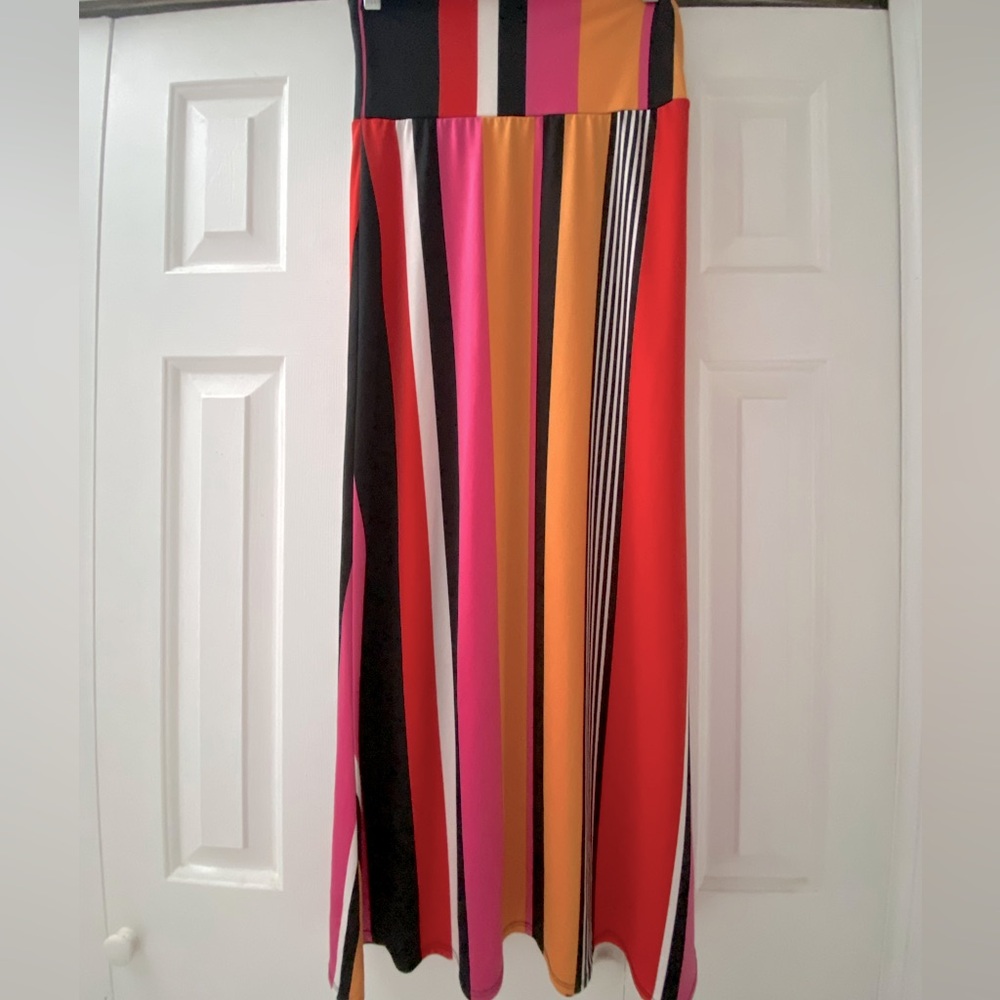 New only worn once . Multi colored striped stretch bodcon maxi skirt size M